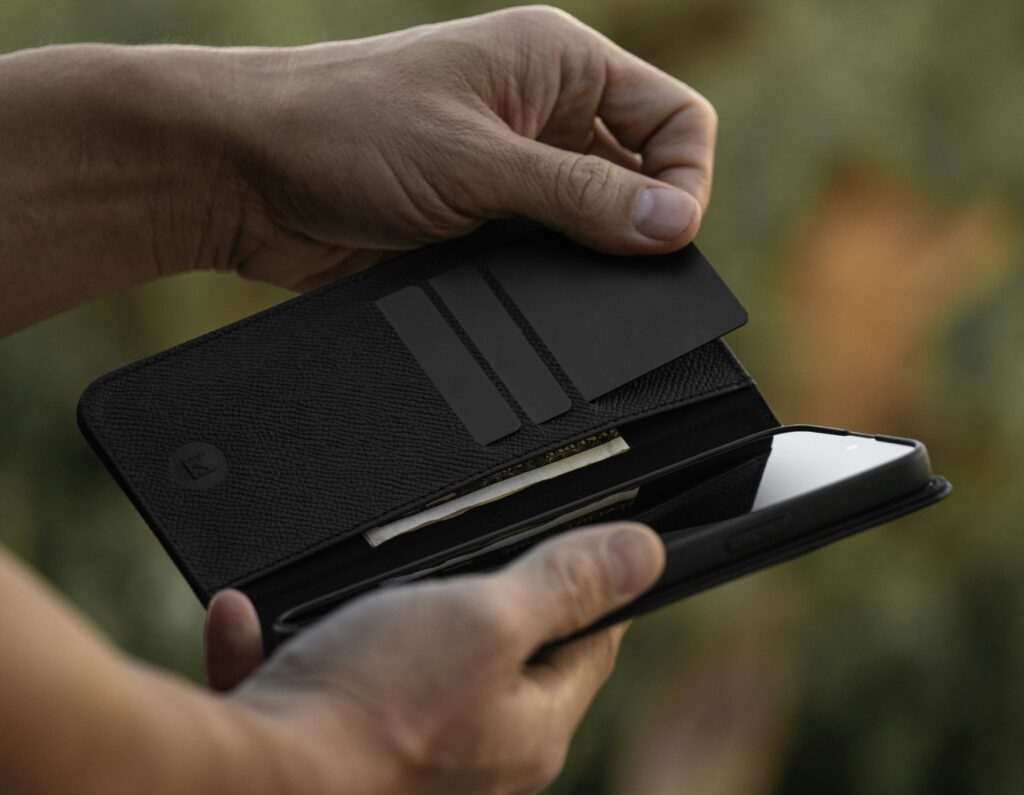 An Apple iPhone inside a wallet