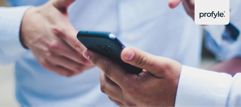 Business people considering business card alternatives