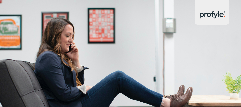 A businesswoman in a casual phone conversation