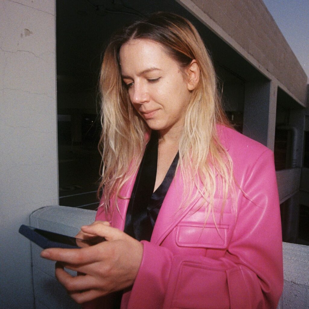 A businesswoman using a digital business card platform