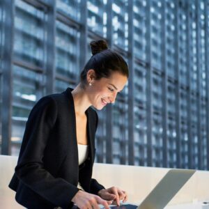A businesswoman managing digital business cards